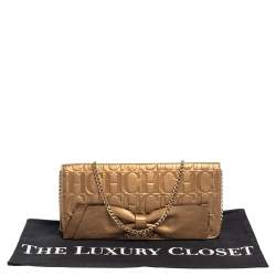 Pre Owned Carolina Herrera Gold Monogram Embossed Leather Bow Chain Clutch