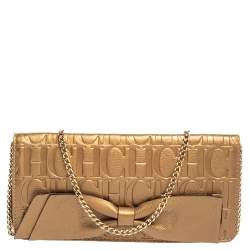 Pre Owned Carolina Herrera Gold Monogram Embossed Leather Bow Chain Clutch