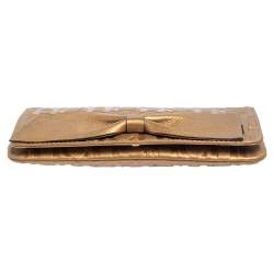 Pre Owned Carolina Herrera Gold Monogram Embossed Leather Bow Chain Clutch