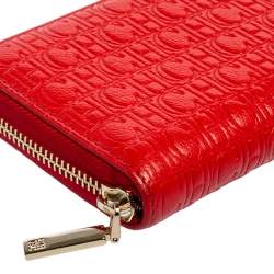 Pre Owned CH Carolina Herrera Monogram Embossed Leather Zip Around Wallet