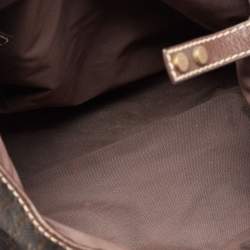 Pre Owned حقيبة يد توتس سي أتش كارولي نا هيريرا جلد وكانفاس مونوغرامي بني غامق بجيب أمامي 