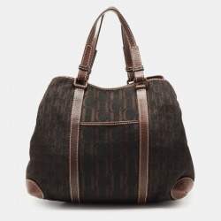 Pre Owned حقيبة يد توتس سي أتش كارولينا هيريرا جلد وكانفاس مونوغرامي بني غامق بجيب أمامي 