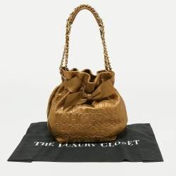 Pre Owned CH Carolina Herrera Metallic Gold Embossed Leather Bow Bucket Bag