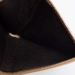 Pre Owned CH Carolina Herrera Gold Floral Embossed Leather Flap Compact Wallet