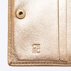 Pre Owned CH Carolina Herrera Gold Floral Embossed Leather Flap Compact Wallet
