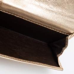 Pre Owned CH Carolina Herrera Gold Floral Embossed Leather Flap Compact Wallet