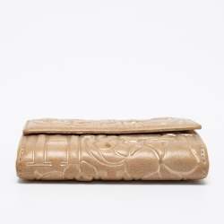 Pre Owned CH Carolina Herrera Gold Floral Embossed Leather Flap Compact Wallet