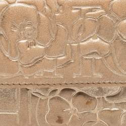 Pre Owned CH Carolina Herrera Gold Floral Embossed Leather Flap Compact Wallet