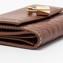 Pre Owned محفظة مضغوطة سي إتش كارولينا هيريرا ماتريشكا جلد مونوغرامي بني فاتح بقفل