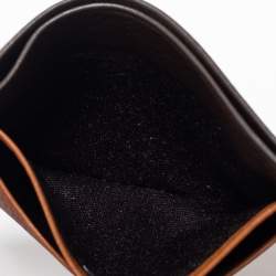 Pre Owned CH Carolina Herrera Tan Monogram Embossed Leather Card Holder