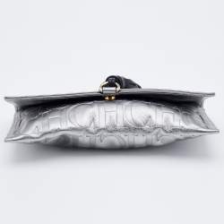Pre Owned CH Carolina Herrera Metallic Silver Monogram Leather Tassel Clutch