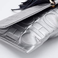 Pre Owned CH Carolina Herrera Metallic Silver Monogram Leather Tassel Clutch