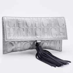 Pre Owned CH Carolina Herrera Metallic Silver Monogram Leather Tassel Clutch