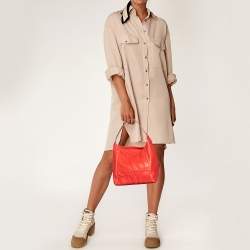 Pre Owned CH Carolina Herrera Red Leather Logo Embossed Hobo