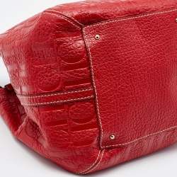 Pre Owned CH Carolina Herrera Red Monogram Embossed Leather Bucket Bag