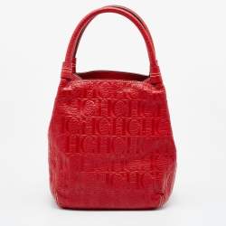Pre Owned CH Carolina Herrera Red Monogram Embossed Leather Bucket Bag