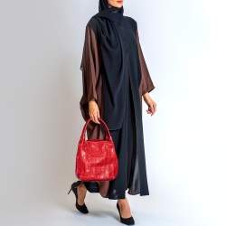 Pre Owned CH Carolina Herrera Red Monogram Embossed Leather Bucket Bag