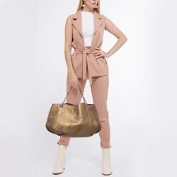 Pre Owned CH Carolina Herrera Gold Monogram Embossed Leather Dahlia Hobo