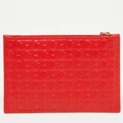 Pre Owned CH Carolina Herrera Red Monogram Embossed Leather Zip Wristlet Pouch