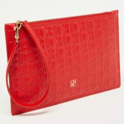 Pre Owned CH Carolina Herrera Red Monogram Embossed Leather Zip Wristlet Pouch
