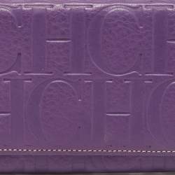 Pre Owned CH Carolina Herrera Purple Monogram Embossed Leather Flap Continental Wallet
