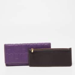 Pre Owned CH Carolina Herrera Purple Monogram Embossed Leather Flap Continental Wallet