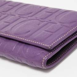 Pre Owned CH Carolina Herrera Purple Monogram Embossed Leather Flap Continental Wallet
