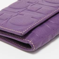 Pre Owned CH Carolina Herrera Purple Monogram Embossed Leather Flap Continental Wallet