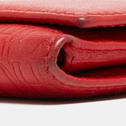 Pre Owned CH Carolina Herrera Red Monogram Embossed Leather Trifold Continental Wallet