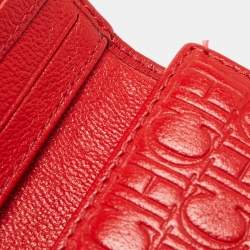 Pre Owned CH Carolina Herrera Red Monogram Embossed Leather Trifold Continental Wallet
