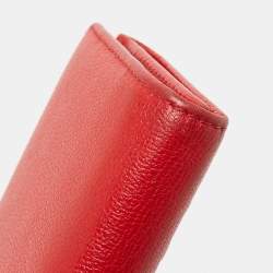 Pre Owned CH Carolina Herrera Red Monogram Embossed Leather Trifold Continental Wallet