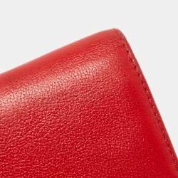 Pre Owned CH Carolina Herrera Red Monogram Embossed Leather Trifold Continental Wallet