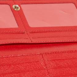 Pre Owned CH Carolina Herrera Red Monogram Embossed Leather Trifold Continental Wallet