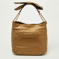 Pre Owned CH Carolina Herrera Gold Embossed Monogram Leather Chain Bow Hobo
