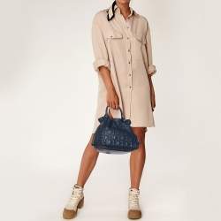 Pre Owned CH Carolina Herrera Blue Monogram Embossed Leather String Bucket Bag