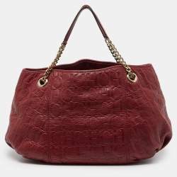 Pre Owned CH Carolina Herrera Red Monogram Embossed Leather Chain Hobo