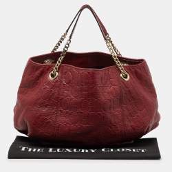 Pre Owned CH Carolina Herrera Red Monogram Embossed Leather Chain Hobo