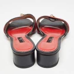 Pre Owned CH Carolina Herrera Black Monogram Embossed Leather Matryoshka Locked Slide Sandals Size 38