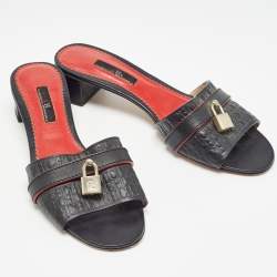 Pre Owned CH Carolina Herrera Black Monogram Embossed Leather Matryoshka Locked Slide Sandals Size 38