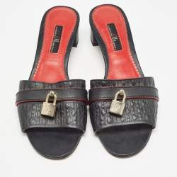 Pre Owned CH Carolina Herrera Black Monogram Embossed Leather Matryoshka Locked Slide Sandals Size 38