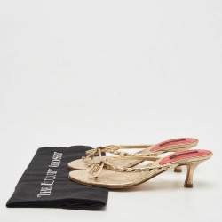 Pre Owned CH Carolina Herrera Gold Studded Leather Bow Logo Charm Thong Sandals Size 36