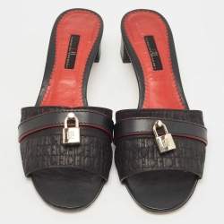 مملوكة مسبقًا CH Carolina Herrera Black Monogram Leather Traveller Locked Slide Sandals Size 40