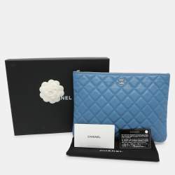 Pre Owned Chanel Blue Quilted Caviar Leather O Case Clutch
