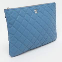 Pre Owned Chanel Blue Quilted Caviar Leather O Case Clutch