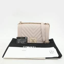 Pre Owned Chanel Beige Chevron Quilted Soft Caviar Leather Medium Boy Flap Bag