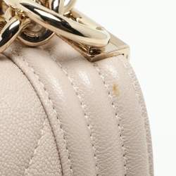 Pre Owned Chanel Beige Chevron Quilted Soft Caviar Leather Medium Boy Flap Bag