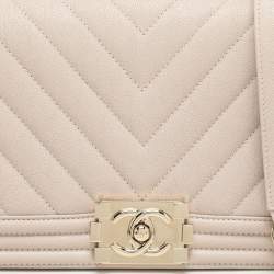 Pre Owned Chanel Beige Chevron Quilted Soft Caviar Leather Medium Boy Flap Bag