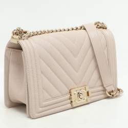 Pre Owned Chanel Beige Chevron Quilted Soft Caviar Leather Medium Boy Flap Bag