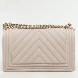 Pre Owned Chanel Beige Chevron Quilted Soft Caviar Leather Medium Boy Flap Bag