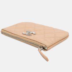 Pre Owned Chanel CC Logo Mini Beige Caviar Leather Pouch Bag
